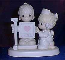 Enesco Precious Moments Figurine - My Heart Is Exposed With Love