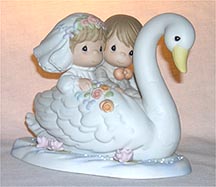 Enesco Precious Moments Figurine - Our Love Will Flow Eternal