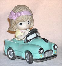 Enesco Precious Moments Figurine - A Rebel With A Cause