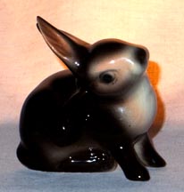 Rabbit Scratching Its Ear - Brown/White Animal Figurine