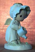 Enesco Precious Moments Figurine - Some Plant, Some Water, But God Giveth Increase