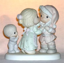 Enesco Precious Moments Figurine - I Saw Mommy Kissing Santa Claus