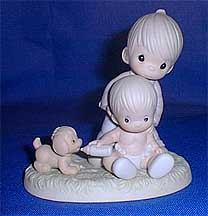 Enesco Precious Moments Figurine - Baby's First Pet