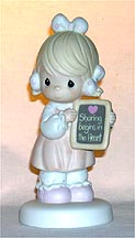 Enesco Precious Moments Figurine - Sharing Begins In The Heart