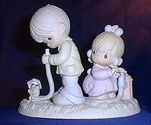 Enesco Precious Moments Figurine - There Shall Be Showers Of Blessings