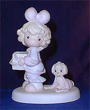 Enesco Precious Moments Figurine - Tied Up For The Holidays