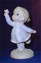 Enesco Precious Moments Figurine - Happiness Is At Our Fingertips