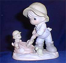 Enesco Precious Moments Figurine - Nothing Can Dampen The Spirit Of Caring