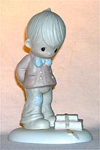 Enesco Precious Moments Figurine - It's What's Inside That Counts